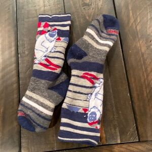 Smart wool socks
￼ yeti skiing on the socks